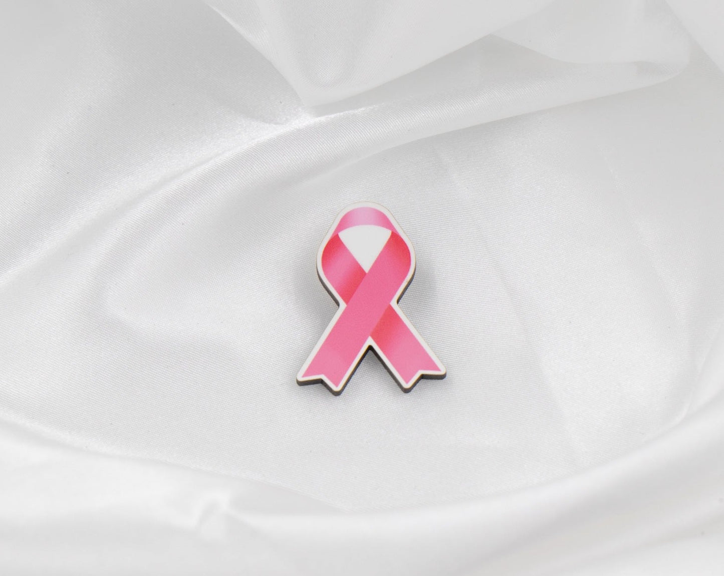 pink ribbon in support for those who have or had breast cancer